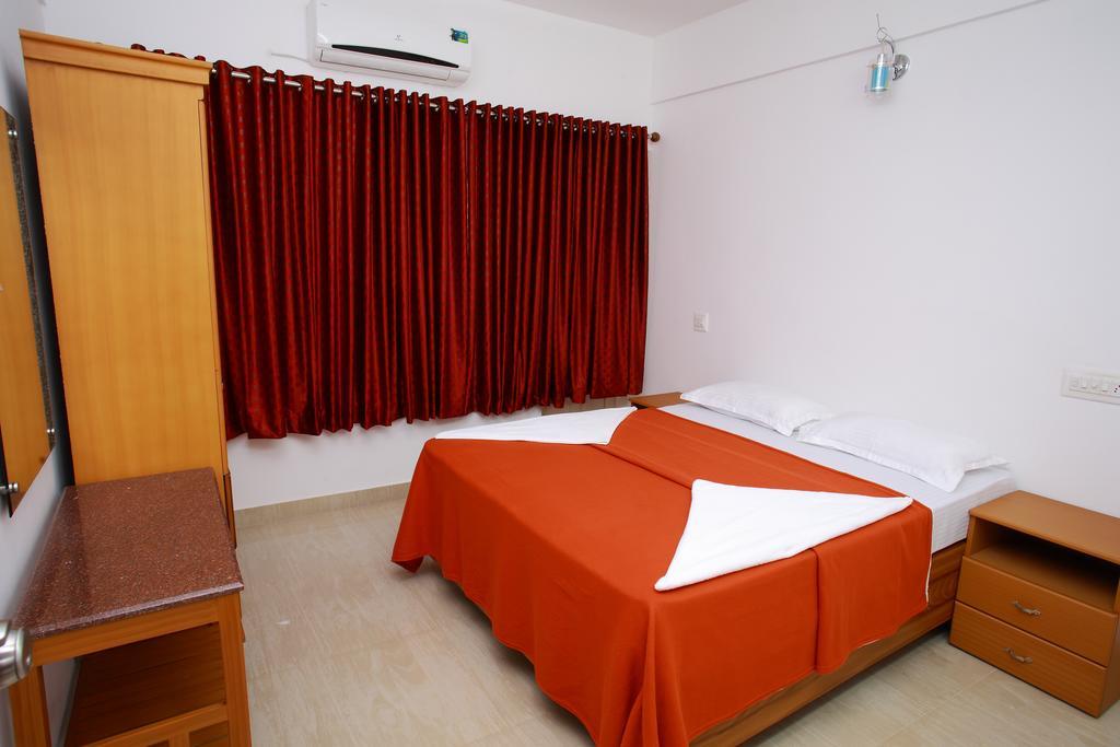 Готель Phils' Residency & Banquets Kochi Номер фото